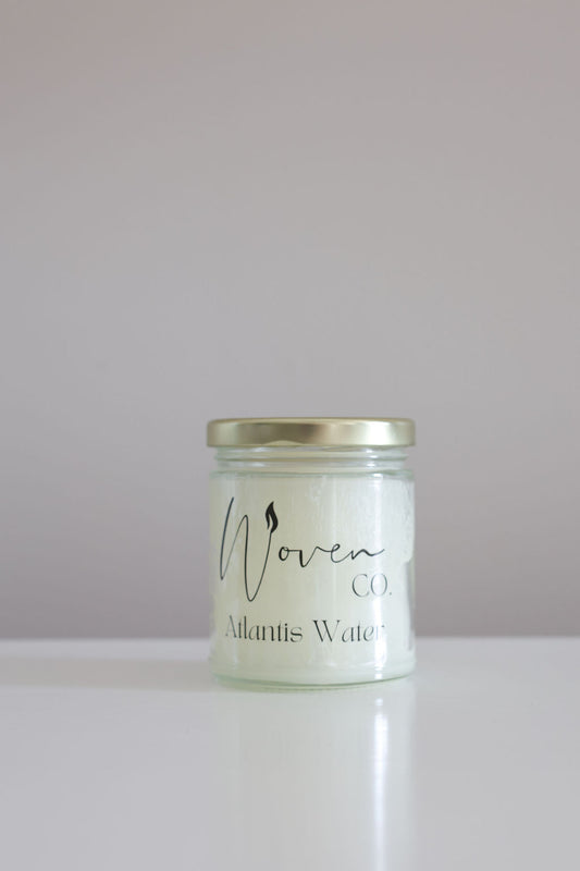Jar of 'Atlantis Water' by Woven on a white background